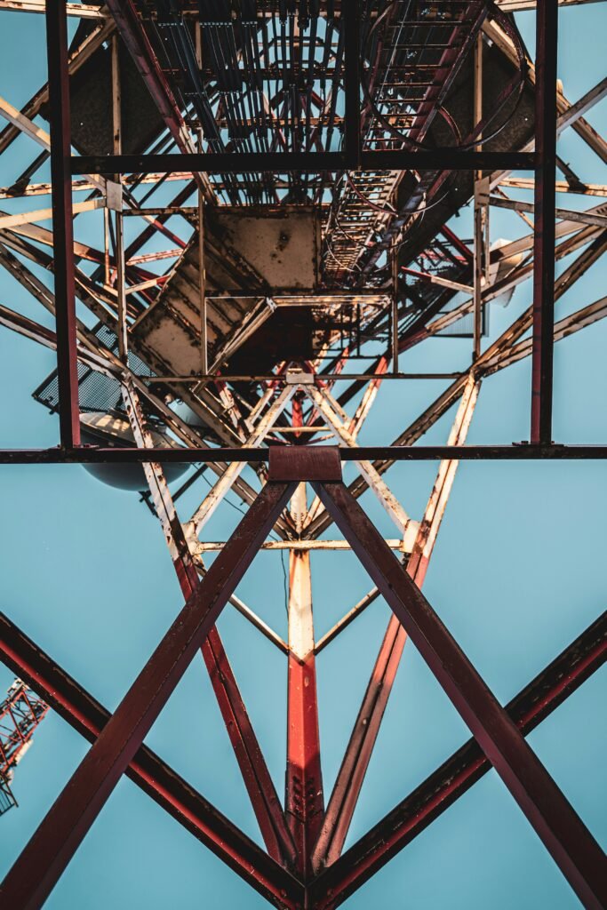 low angle view of red metal tower